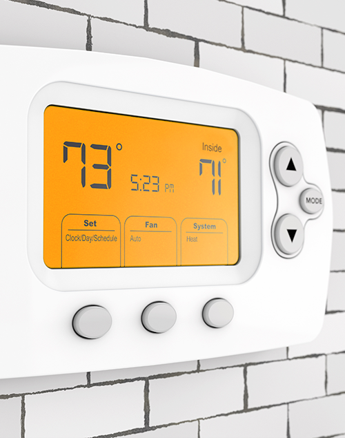 Digital thermostat displaying temperature settings